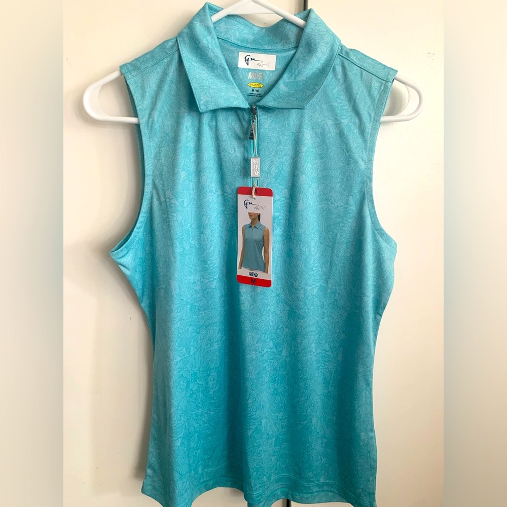 Greg Norman ladies golf shirt. NWT
